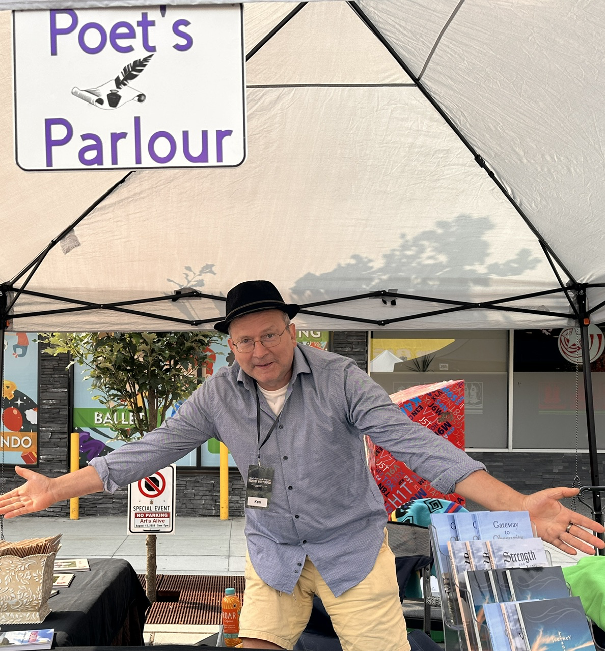 Ken Westdorp welcoming visitors at the Poet's Parlour booth during Arts Alive Festival 2026