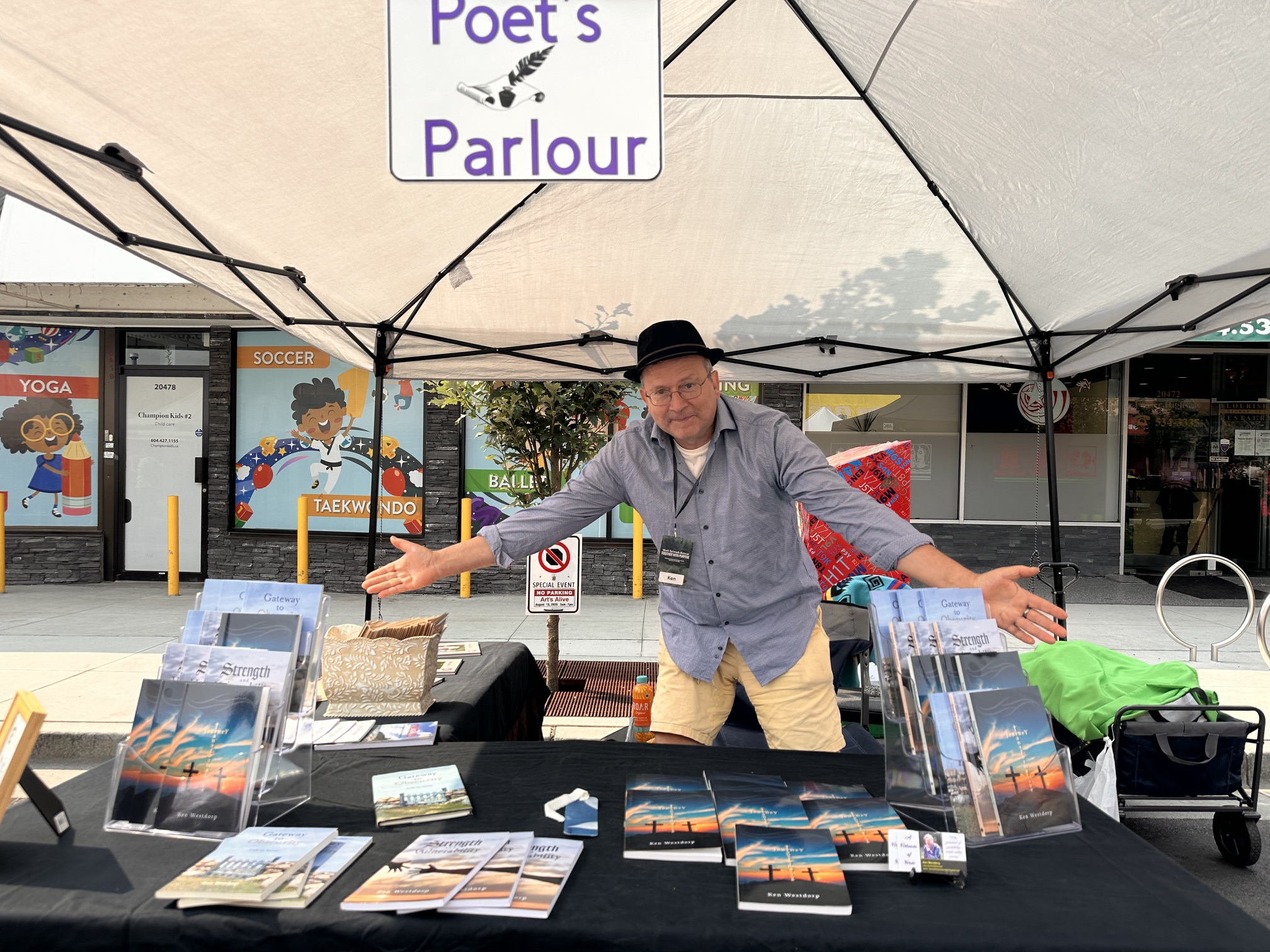 Fyreborn Words books displayed at the Poet's Parlour table during Arts Alive Festival 2026