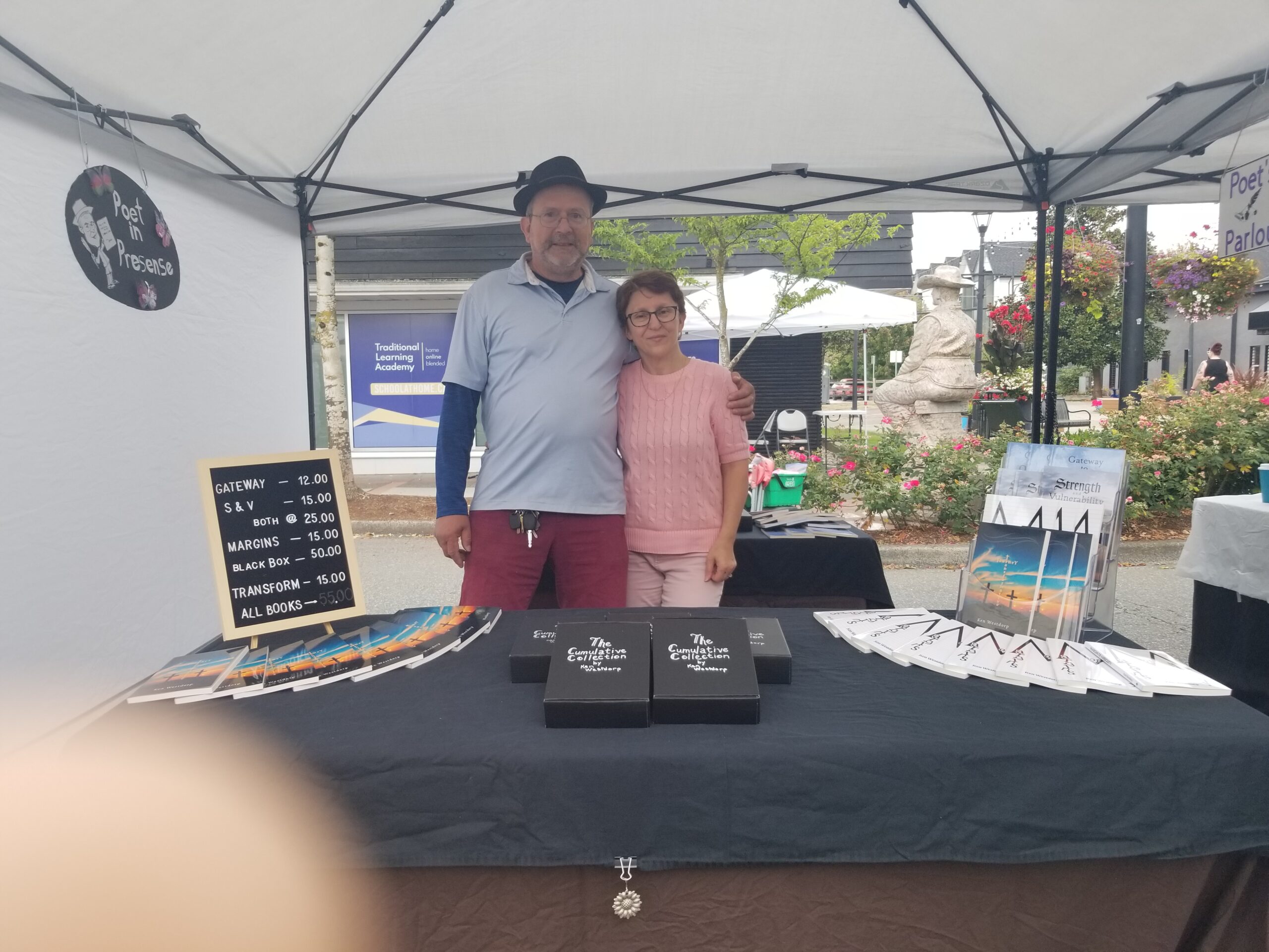 Ken and Ardita at the Fyreborn Words table during Cloverdale Market Days
